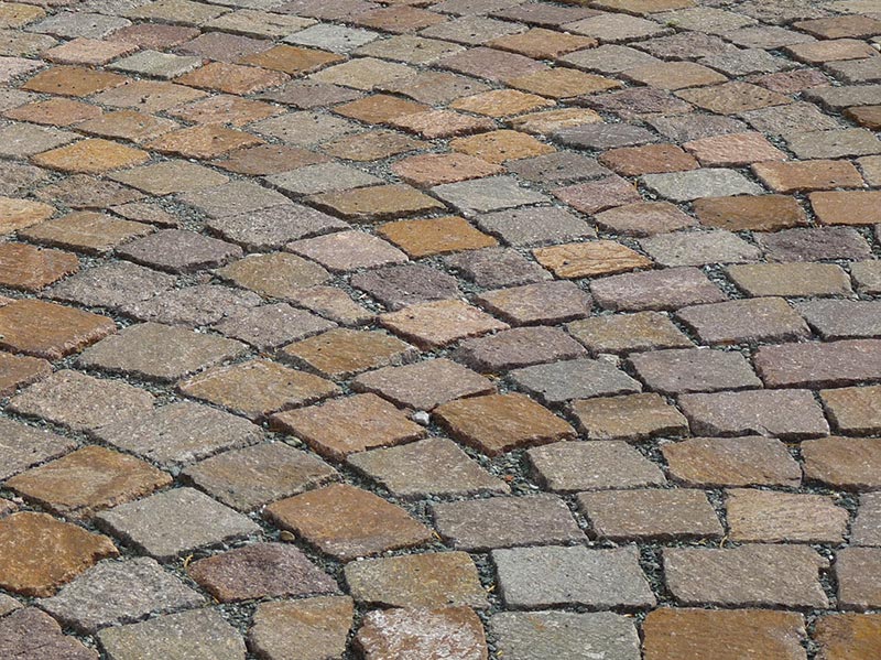 Porphyr farbl. gemischt, spaltrau MHI NATURSTEIN & BAUSTOFFSERVICE GMBH